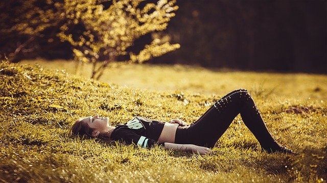 Girl Lying On The Grass Girl Legs 